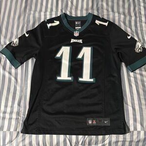 Black and green Eagles Carson Wentz jersey.